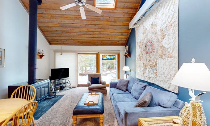 Glen Arbor Condo | River-view condo with fireplace, deck, washer/dryer, and community firepit