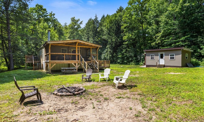Schroon Lake House | Riverfront home with huge screened deck - dog-friendly, fireplace & fast WiFi