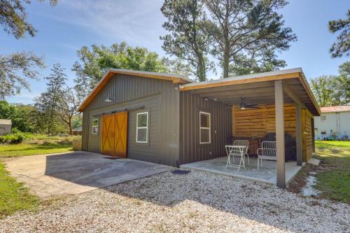 Foley House | Riverfront Magnolia Springs Cabin Rental with Grill