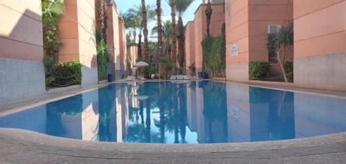 Lagouassem Apartment | Riyad Entier Avec piscine Red Moon Kech