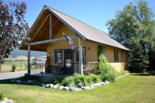Whitehall House | Romantic Cabin Rental with a Delightful Porch near Ennis, Montana