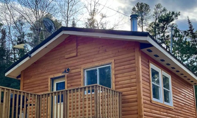 Sioux Narrows Nestor Falls Cabin | Romantic Cabin with Woodstove, Shared Hot Tub and Infrared Sauna.