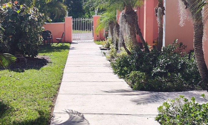 Coral Harbour House | Romantic Getaways or Family fun. Enjoy Island Vibes at 2BR Townhome Near Beach!