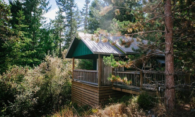 Olga Cottage | Romantic Lummi Cottage, Secluded in the Trees with Water View & Beach Path