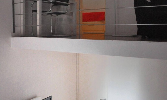 Rione XVIII Castro Pretorio Apartment | Rome: Sleeping space and living room - two levels between Repubbli