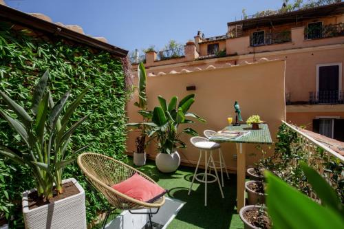 Rione IV Campo Marzio Apartment | Rooftop Boho Loft Spanish Steps