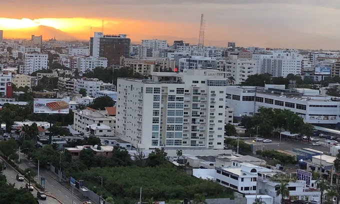 Downtown Santo Domingo Condo | Rooftop Pool with Ocean and City Views