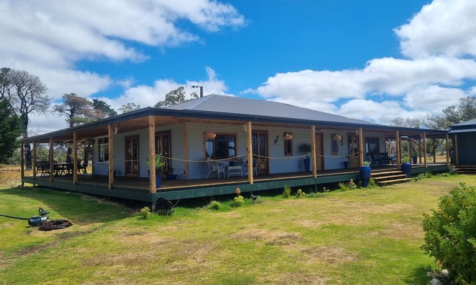 Duncan House | RoolagoonHomestead large deck and large gardens ideal for families. Pet friendly