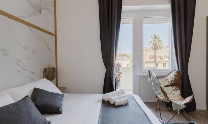 Oristano House | Room 'Family Suite' with Private Terrace, Wi-Fi and Air Conditioning