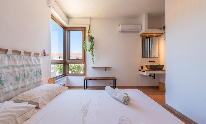 Sarroch Apartment | Room 'Istè' with Sea View, Private Terrace and Air Conditioning