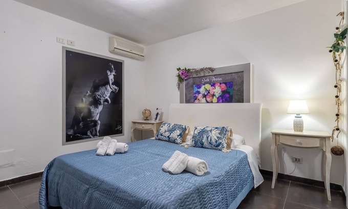 Sorso Apartment | Room 'Peonia' with Shared Pool, Shared Terrace and Air Conditioning