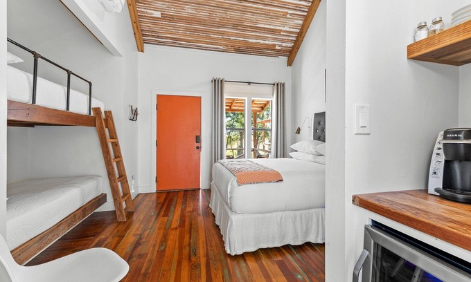 Comfort Cabin | Room with One Queen and Two Twin Beds, Private Patio with Creek View