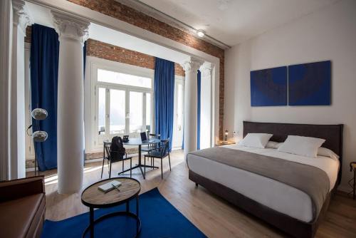 Justicia Hostel | room00 Gran Vía Hostel