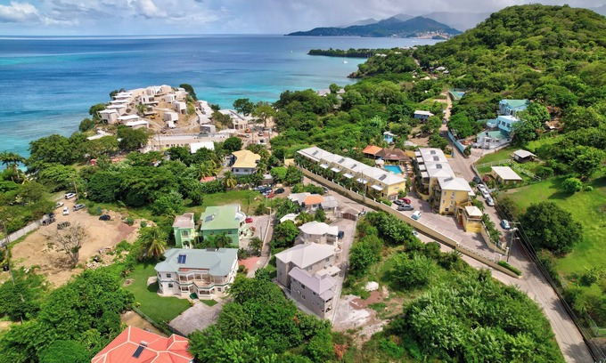 Morne Rouge Apartment | Roomy [1,001 sq ft] two bedroom Unit, steps away from white sand beach.