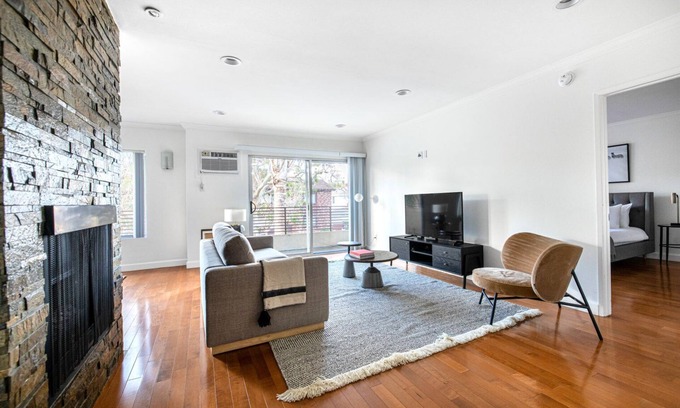 Sawtelle Apartment | Roomy Brentwood 2BR w/Gym + Courtyard, walk to Dining, by Blueground