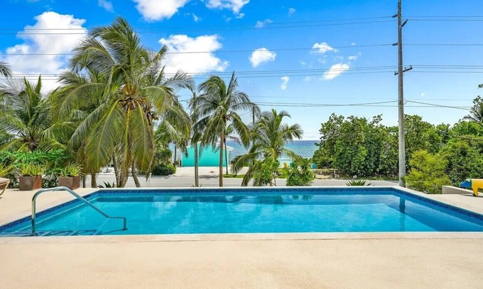 North Side House | Rum Reef, 6 bedroom house in North Side, pool, private beach, kayaks, bikes.