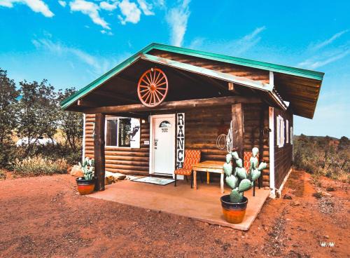 Monticello House | Rustic Cabin Rental with Porch at Foot of Abajo Mountains near Moab, Utah