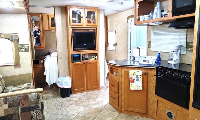 New Smyrna Beach House | RV NSB Sun & Shade Tree, Pool & Picnic RV Vacation