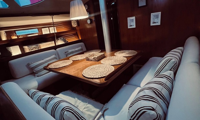 Mahon Boat Rental | Sailboat moored in the exclusive port of Mahon, ideal for couples and friends.