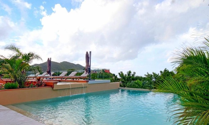 Anse Marcel Apartment | Saint-Martin: Luxurious 2-Level Apartment with Terrace, Pool, Fiber Internet and Air Conditioning