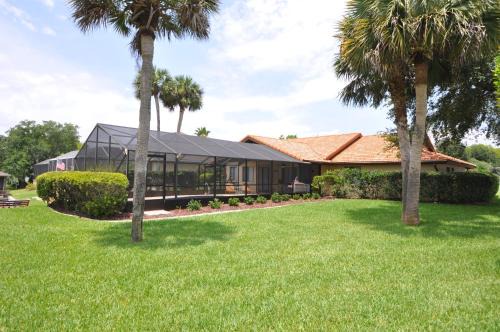 Palm Harbor House | Salt Life Cozy Canal Front Pool Home W boat dock
