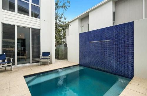 Twin Waters House | Saltbreeze - Laidback Poolside Living by the Canal