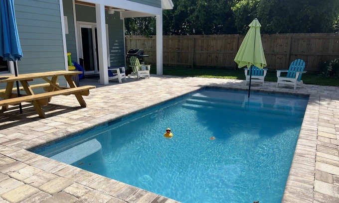 St. Augustine Beach House | Sand pail Beach Cottage 3+/2.5 house- steps to the beach-private pool- 5 stars