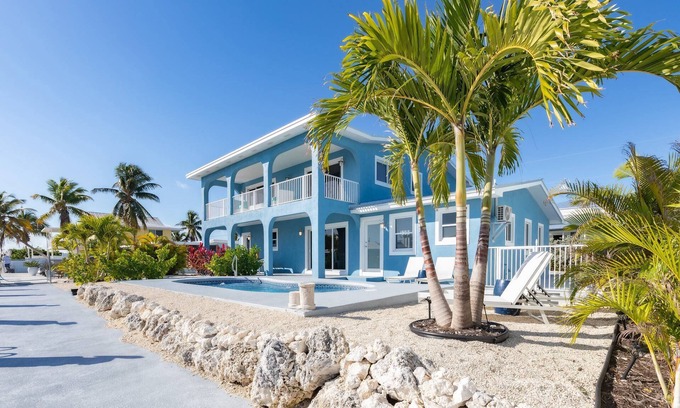 Marathon House | Sandal Escape: 6BR Canal Front Oasis w/Heated Pool, Dog-Friendly, Dockage & Fast Atlantic Access