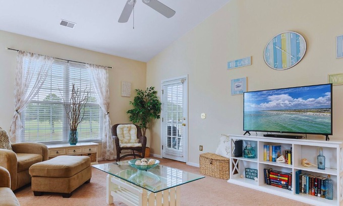 Sunset Beach Condo | Sandpiper Bay 3 bedroom/2 bath condo with stunning water/course views!
