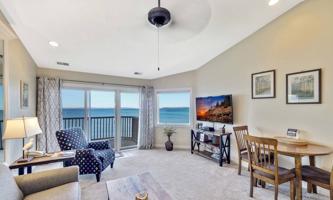 Traverse City Condo | Sandy Beachfront | Condo #328 | Pool | Hot Tub | Balcony Lake Views