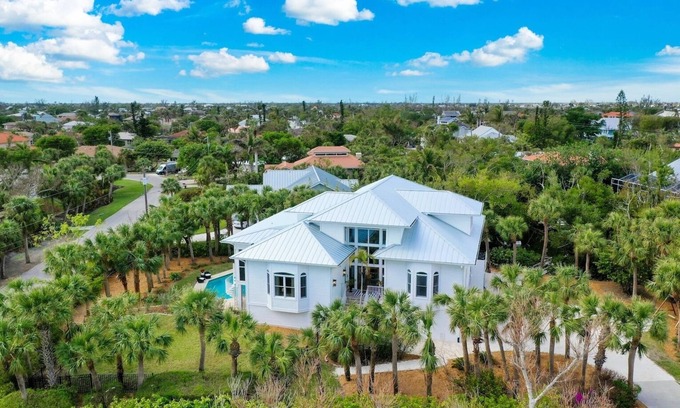 Shell Harbor House | Sanibel 6 bedroom Luxury Home with Pool,One Block from Beach,Pier and Canal View