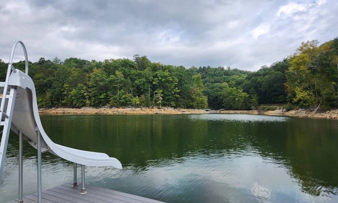 Caryville Cottage | Sapphire Cottage - Waterfront w/Covered Dock & Slide, Gentle Slope to Water