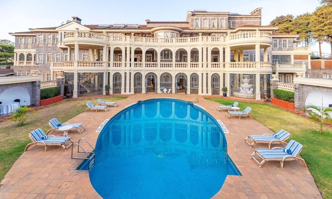 Limuru House | Scenic Escape: Elegant Room Overlooking Lush Grounds