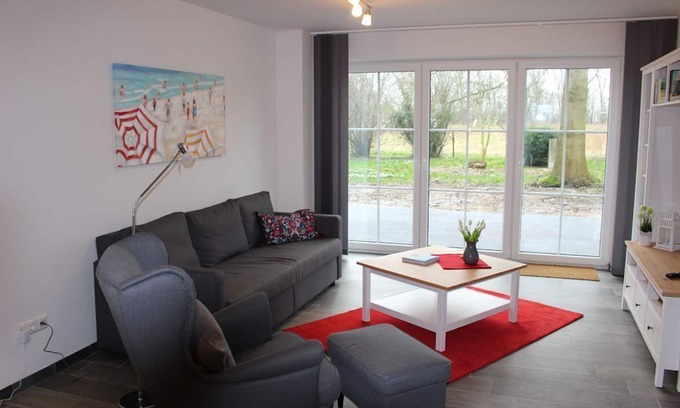 Norden Apartment | Schöne Ferienwohnung Zur Werkstatt für 4 Personen + Hund