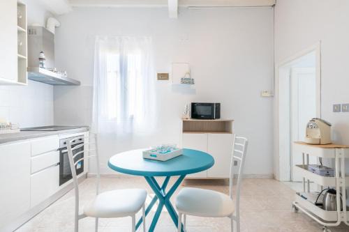 Venezia Nuova Apartment | Sea Foam House by Pleiades Home