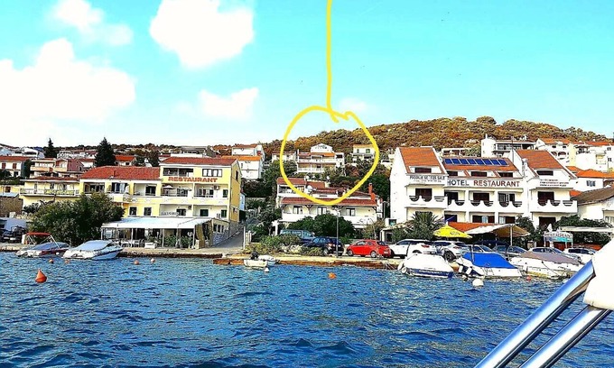 Tijesno Apartment | Sea view, 70 m², directly on the sea in Tisno, 2 bedrooms and bathroom