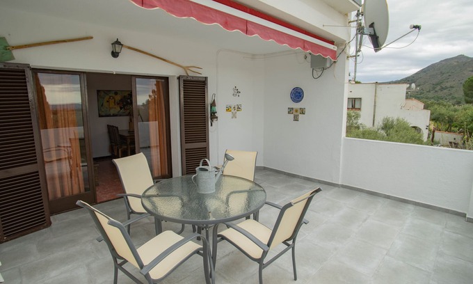 El Mas Bosca Apartment | Sea view, terrace 20 m2, WIFI, parking, barbecue and garden of 1000 m2.