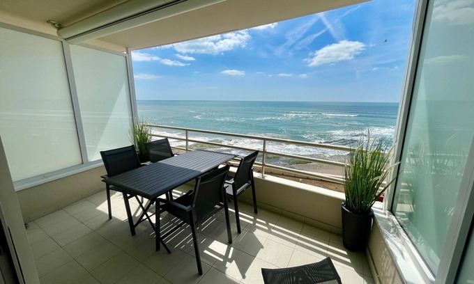 Les Sables d'Olonne Apartment | Seafront T2 Apartment with Terrace, Garage, and Stunning Bay View