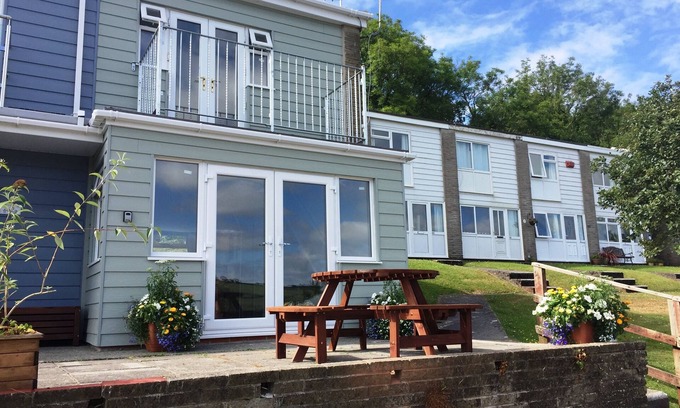 Pembroke Cottage | 'Seahorse' - a Holiday Home with Balcony, Patio and Sea View