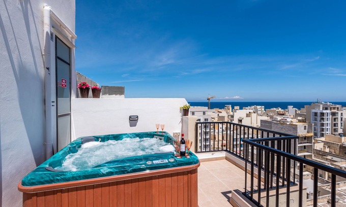 Bugibba Apartment | Seashells Penthouse Hot Tub Seaview by Getaways Malta