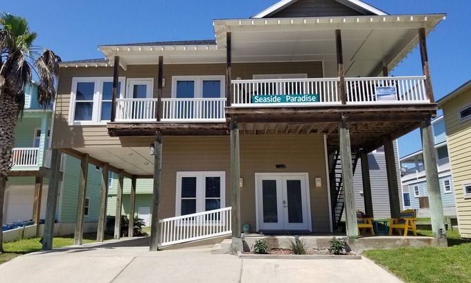 Sand Point House | Seaside Paradise – 4BR/3BA – Steps from the beach boardwalk and pool.