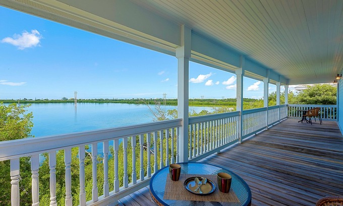 Key West House | Seaside Retreat: Waterfront Home with private heated pool & lush landscaping