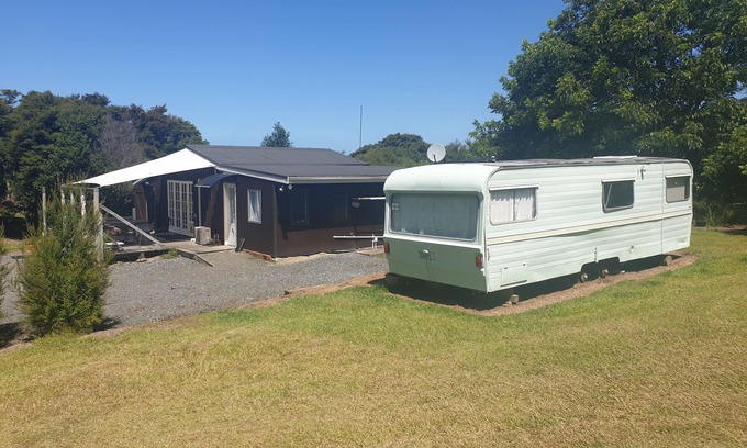 Tuateawa Cottage | Secluded Cottage in bush and garden setting and close to the sea