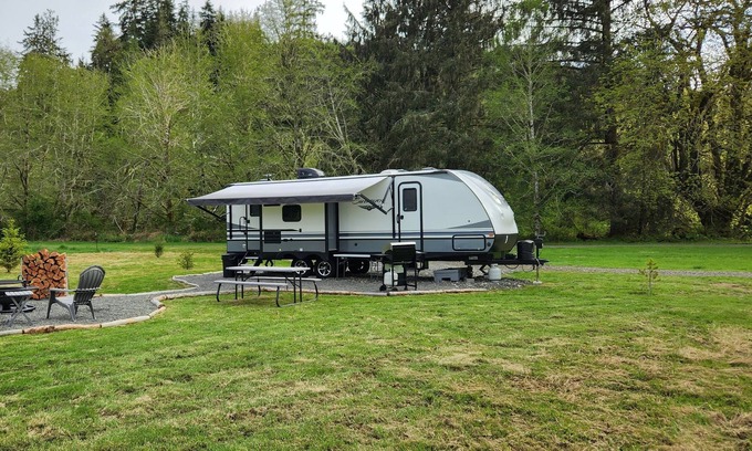Forks House | Secluded riverfront retreat in the meadows near lapush