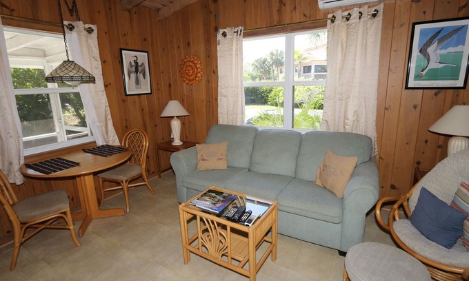 Tradewinds Cottage | Secluded Two Bedroom Cottage, Walking Distance to Sanibel Beaches - Tiki Cottage A!
