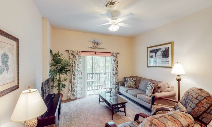Bahama Bay Condo | Second-floor condo with basketball court, tennis court, sauna, restaurant, pools