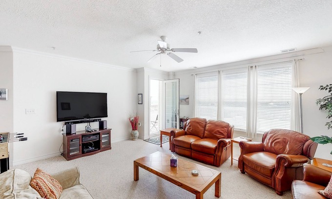 Sandbridge Condo | Second-floor, ocean view condo with balcony, foosball, WiFi & on-site pool/gym