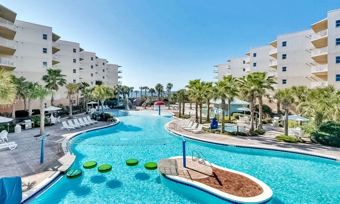 Fort Walton Beach Condo | Second floor beachfront condo with pool and hot tub access, W/D, and central AC