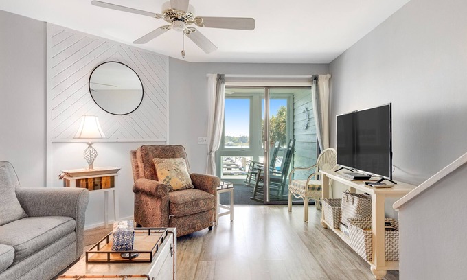 Folly Beach Villa | Second-floor villa w/river views & community pool, tennis courts, and dock