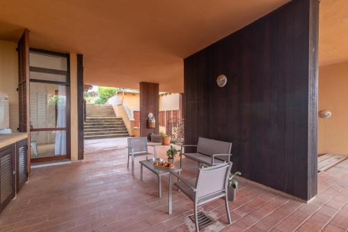 Portisco Apartment | Secret Garden House - Happy Rentals